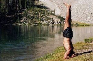 Pawan practicing yoga at an alpine lake